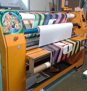 Calandra per trasferimento termico di bandiere, stendardi, striscioni, tessuti in poliestere