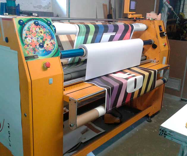 Calandra per trasferimento termico di bandiere, stendardi, striscioni, tessuti in poliestere